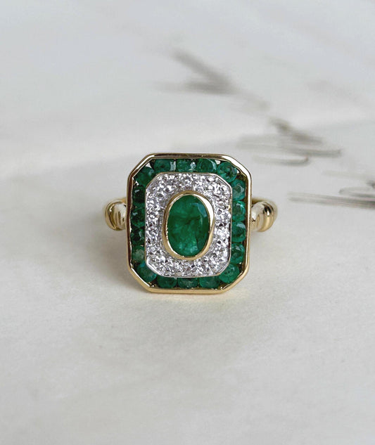 Bague ancienne style Art déco entourage octogonale émeraudes et diamants en or 18k