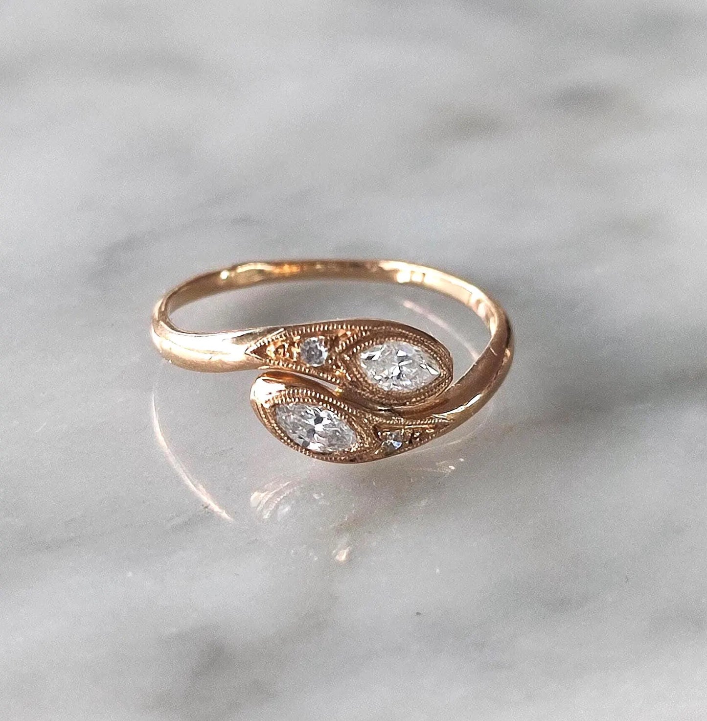 Bague serpents enlacés or 18K diamants navette 0,20 ct "Toi et Moi" vintage