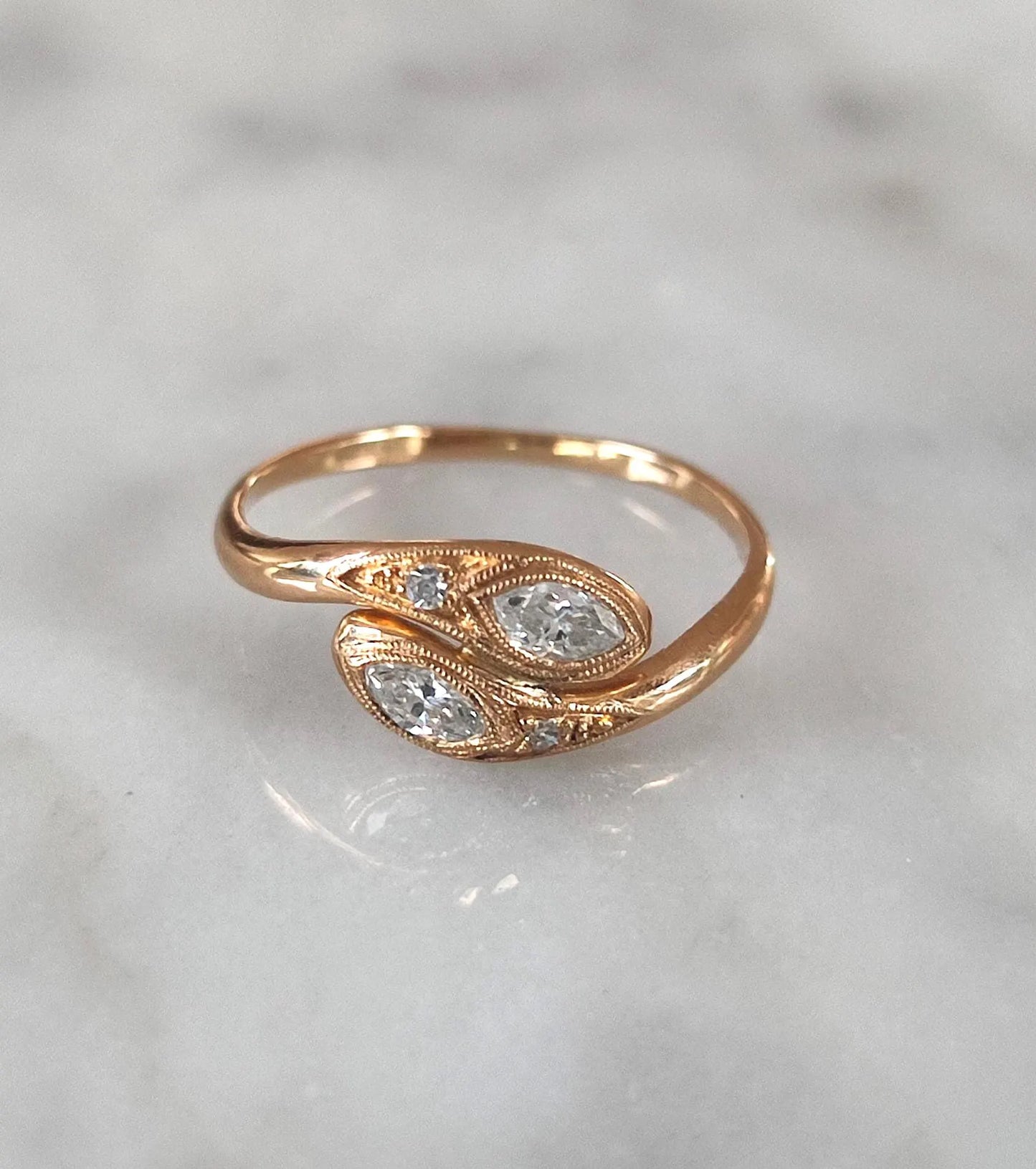 Bague serpents enlacés or 18K diamants navette 0,20 ct "Toi et Moi" vintage