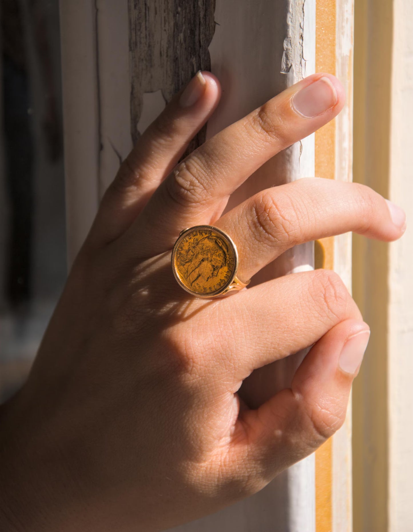 Bague en or 18k montée d'une authentique pièce Marianne 10F en or